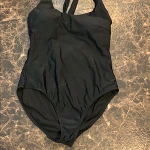 Black on price swimsuit with open back.